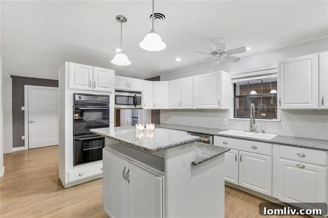 Treetop Midcentury Gem in Eastwood Estates: Incredible Value at $450K 8 Spacious Open-Concept Kitchen in Midcentury Home