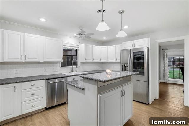 Treetop Midcentury Gem in Eastwood Estates: Incredible Value at $450K 9 Kitchen Island and Dining Area View