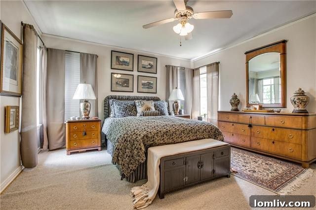 Inviting bedroom with large window in a classic Dallas cottage