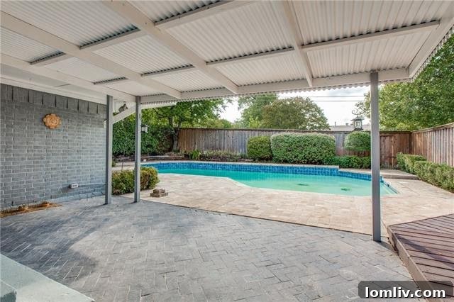 Discover Elegant Style and Grand Renovations at Dallas Open Houses This Week 17 Private swimming pool and updated outdoor space at 8712 Westglen Drive