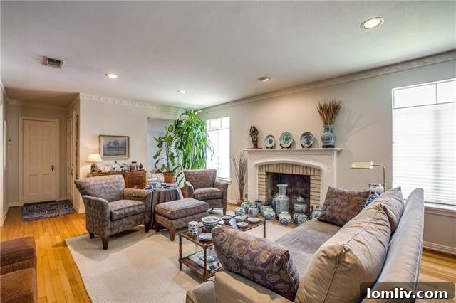 Cozy living room with original fireplace and red oak floors in Devonshire