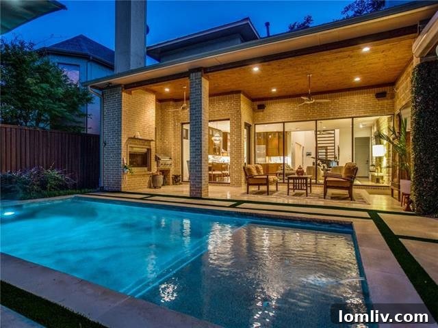 Sleek Style Takes Center Stage in Dallas Open Houses 7 Covered Outdoor Living Area with Fireplace