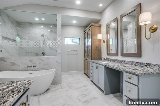 Elegant master bathroom with oversized walk-in shower and contemporary soaking tub.