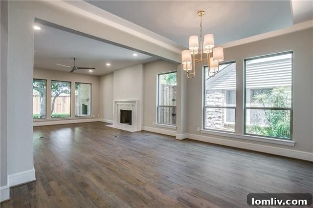 Open concept living and dining area in a Dallas luxury home.