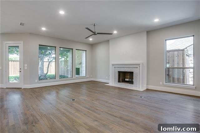 Contemporary wood-burning fireplace in the main living area of 6225 McCommas Blvd.