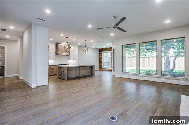 Expansive windows provide ample natural light in this custom Dallas home.