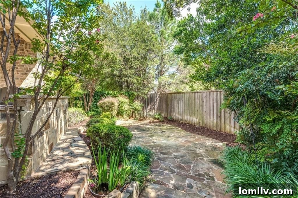 Low-maintenance flagstone patio with minimal grass
