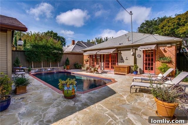 Lushly landscaped gardens surrounding the pool.