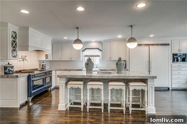 Custom kitchen with a bold cobalt blue ILVE stove, new cabinetry, and built-in banquette