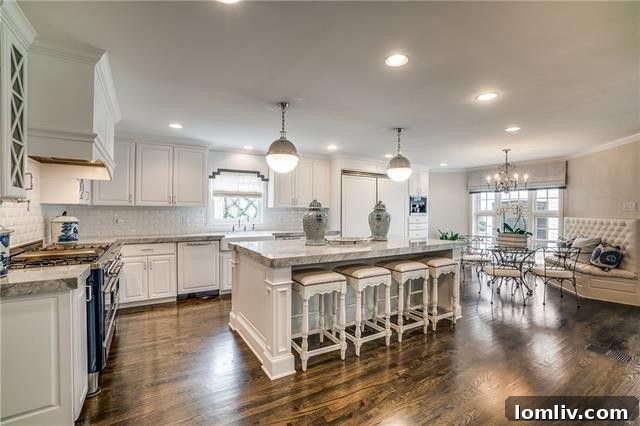 Another angle of the gourmet kitchen, highlighting its spaciousness and custom design