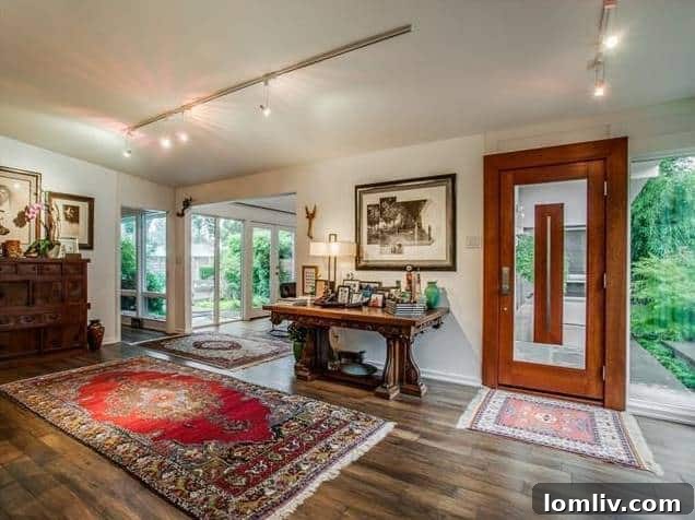 Bright Foyer with Hardwood Floors and Natural Light