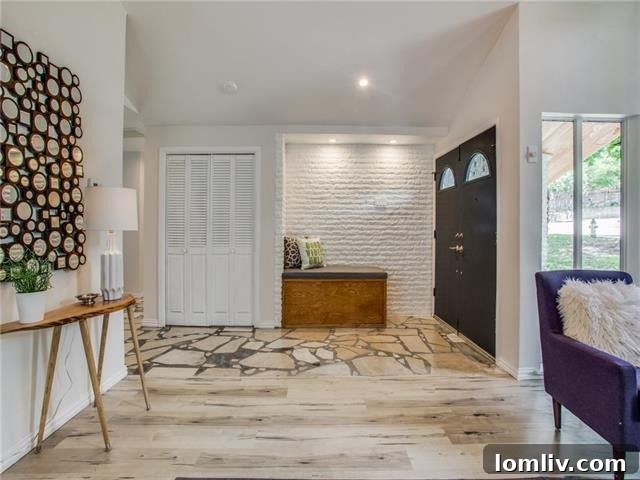 Broken Bow Beauty: The Premier Destination for Holiday Roasts 4 Modern kitchen with a large island and dining area, featuring stylish cabinetry and exposed brick in this Dallas home