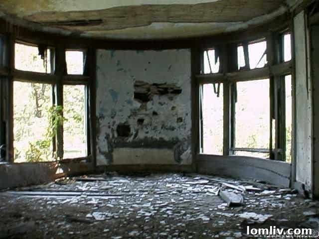 Further interior shots showing extreme dilapidation and decay.