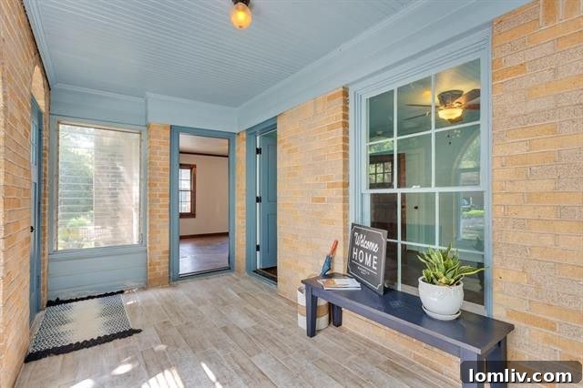 Interior living space with gleaming hardwood floors and abundant natural light at 514 Blair Boulevard