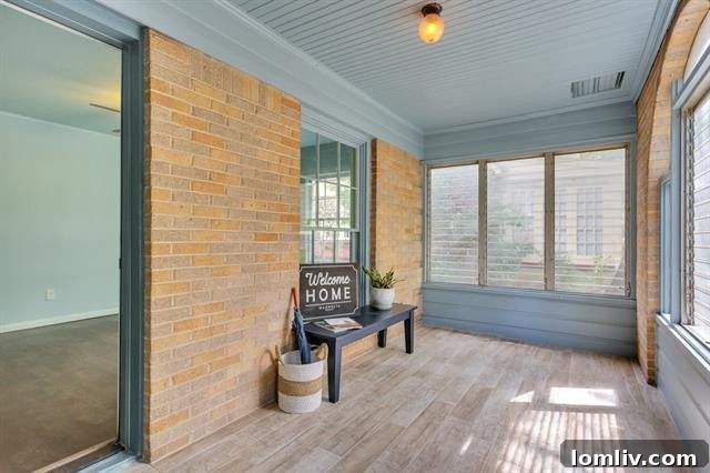 Another perspective of the bright and inviting living room, showcasing its spaciousness