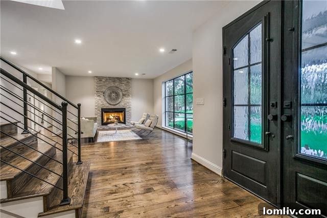 Your Perfect Modern Ranch Perch 4 Spacious Living Room with Fireplace at 9744 Van Dyke Road