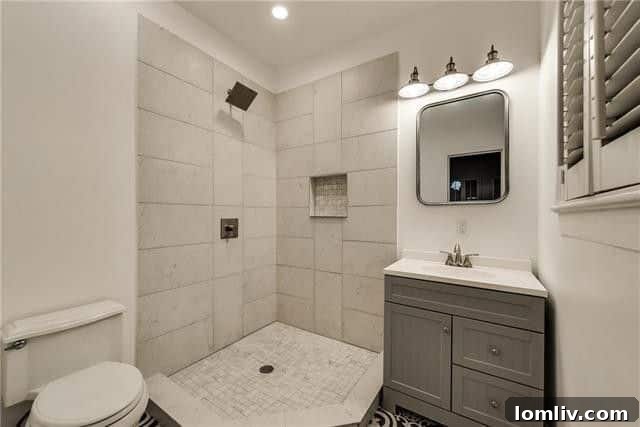 Elegant bathroom with contemporary fixtures and ample space