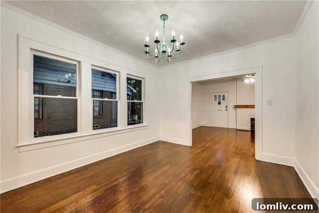 Bright interior space showing architectural details of a historic home
