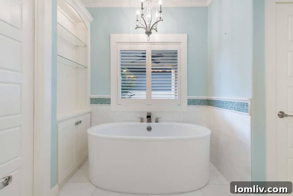 Master bathroom double shower with rain-head and elegant tiling
