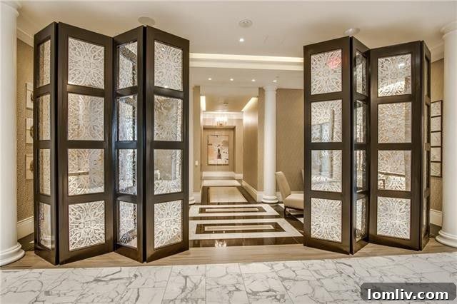 Elegant living room with designer furniture, high ceilings, and large windows in a Dallas luxury condo