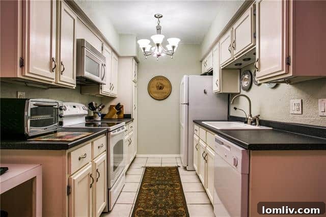 A well-appointed, good-sized kitchen in Unit 204, complete with a cozy breakfast nook.