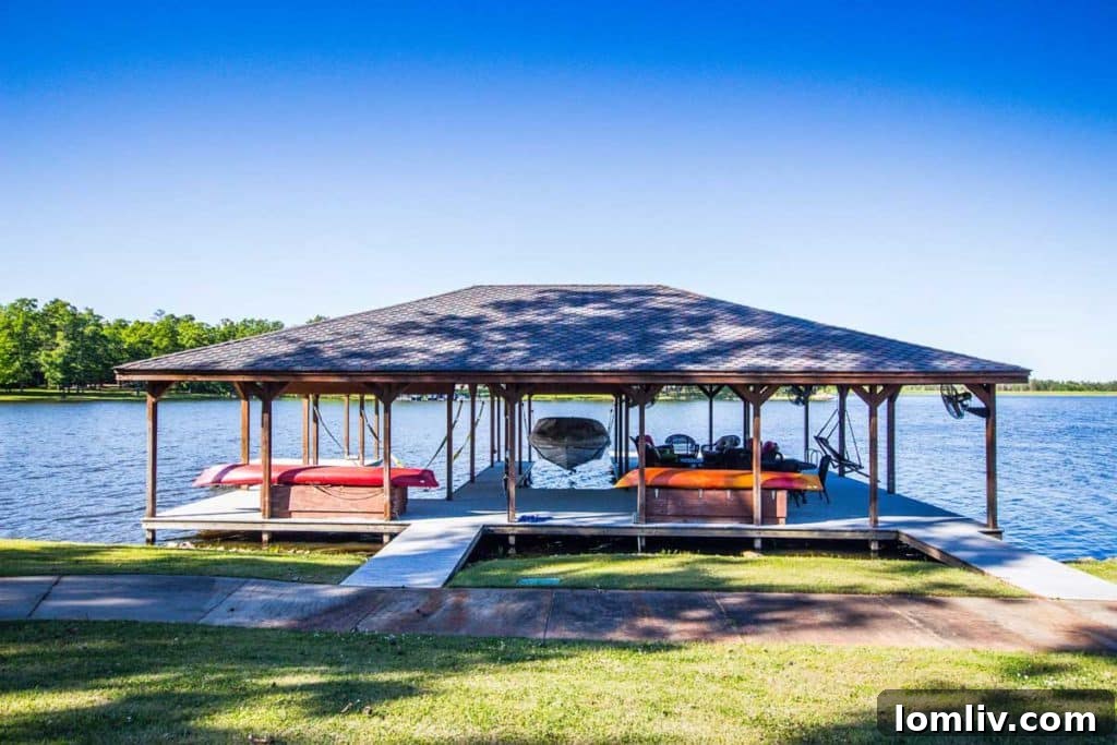 Interior view of a spacious and elegantly furnished living area within the East Texas lodge-style home, bathed in natural light.