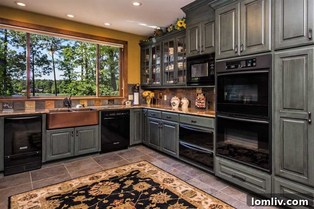 Luxurious master bathroom with a corner jetted tub, a separate rainwater shower, and elegant finishes, offering a spa-like experience in this East Texas estate.