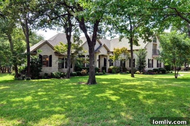 Charming Traditional home exterior with mature trees