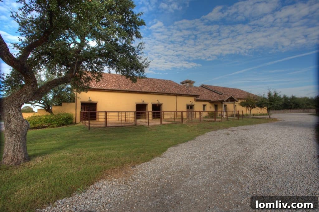 Luxurious horse barn interior featuring eight oversized 17x18 foot stalls