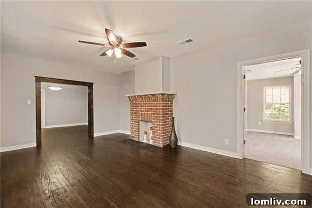 A spacious living room inside the 720 Elsbeth Street property, perfect for family gatherings.