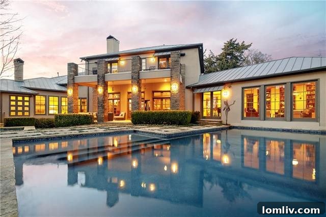 A stunning contemporary home with a dramatic hilltop setting, overlooking Stevens Park Golf Course in Oak Cliff's Kessler Park.