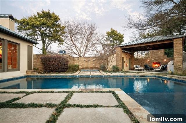 The stunning swimming pool and outdoor area of the luxury home, perfect for relaxation and entertainment in Kessler Park.