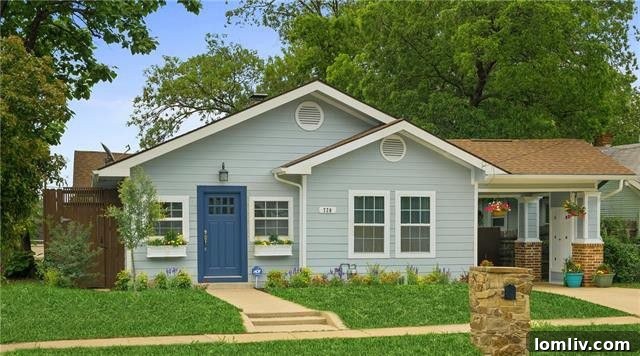 A charming Craftsman home exterior at 720 Elsbeth Street, featuring a welcoming porch and classic architecture near Bishop Arts.