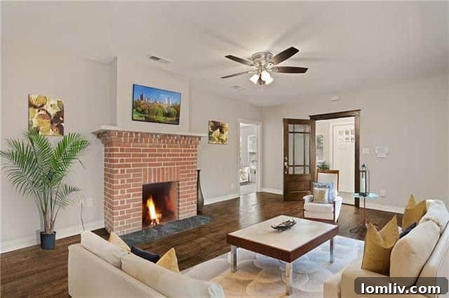 The beautifully updated kitchen of the Elsbeth Street Craftsman, featuring quartz countertops and white shaker cabinets.