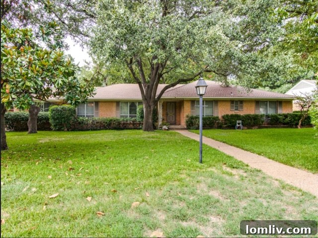 Before Renovation: 5409 Preston Haven, a classic 1960s ranch home showing signs of wear.