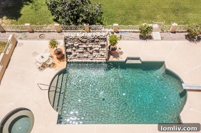 70s Reflection Rocks the Panel 4 Beautiful swimming pool area with patio at the Peoria home