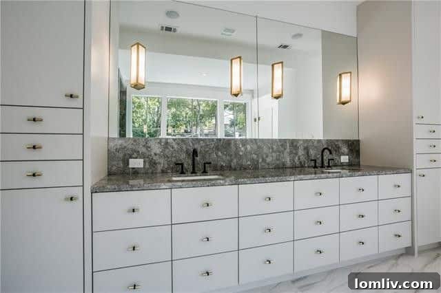 Spacious Walk-in Shower with Modern Tiling and Glass Enclosure
