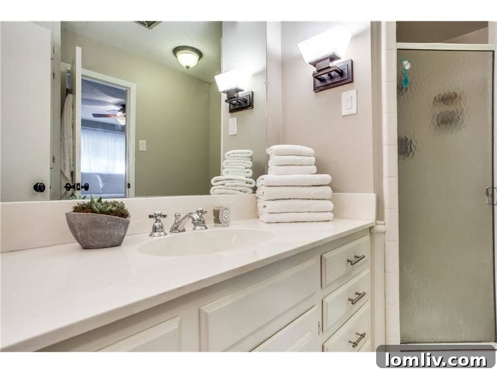 Before Renovation: Original Bathrooms at 3808 Cedarbrush Drive