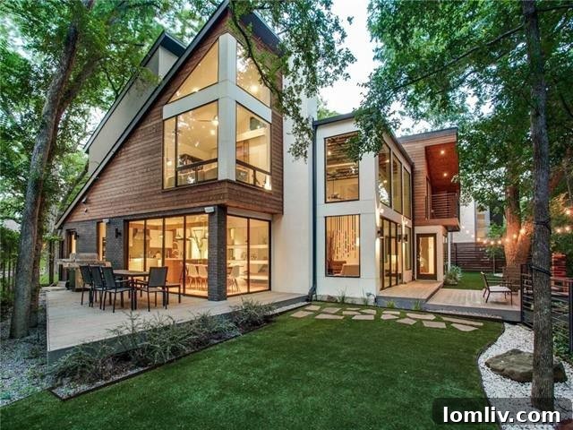 Modern minimalist home exterior with angular design and natural surroundings in Lake Highlands, Dallas.