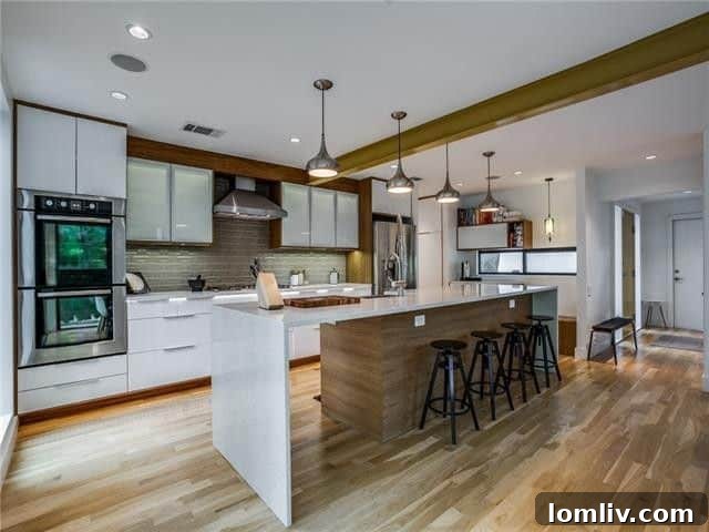 Spacious kitchen with modern cabinetry and ample counter space, perfect for entertaining.