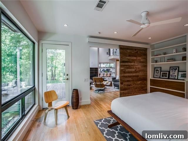 Expansive outdoor space with modern architectural elements, overlooking nature.