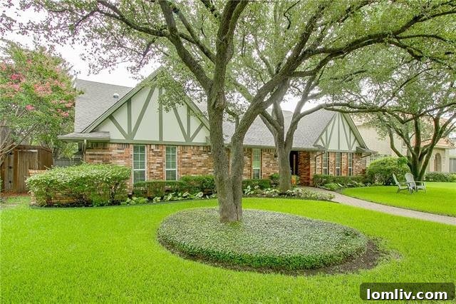 Inviting front porch of a Tudor-style home with classic architectural details.