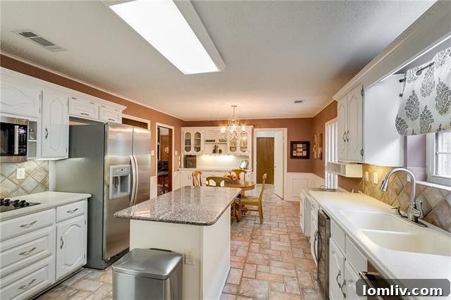 Expansive living space showcasing classic architectural elements and comfortable furnishings.