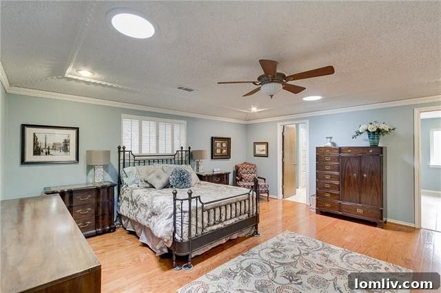Well-equipped kitchen with stainless steel appliances, a center island, and ample cabinetry.