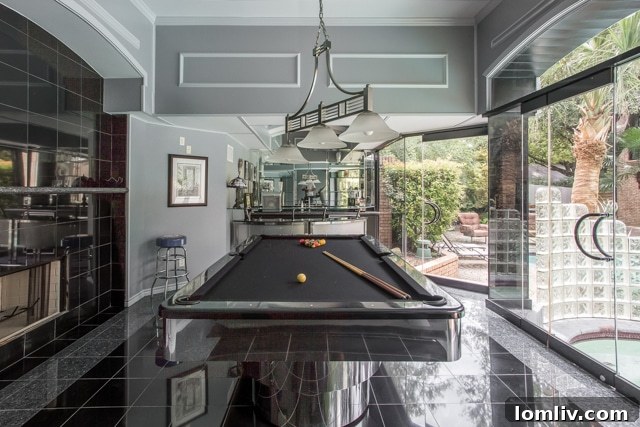 Glass-walled cabana with hot tub access at 2201 Hidden Creek Road.