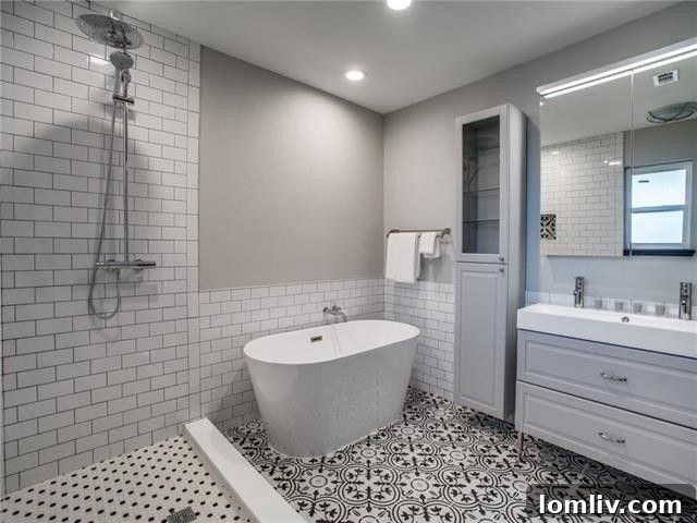 Luxurious five-piece en suite master bathroom, showcasing high-end finishes and thoughtful design