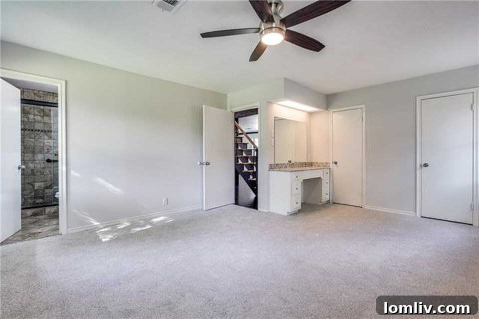 Renovated bathroom with a contemporary vanity, elegant fixtures, and a clean, modern design