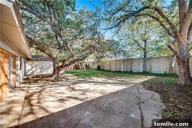 Well-maintained backyard offering ample space for outdoor activities and private enjoyment