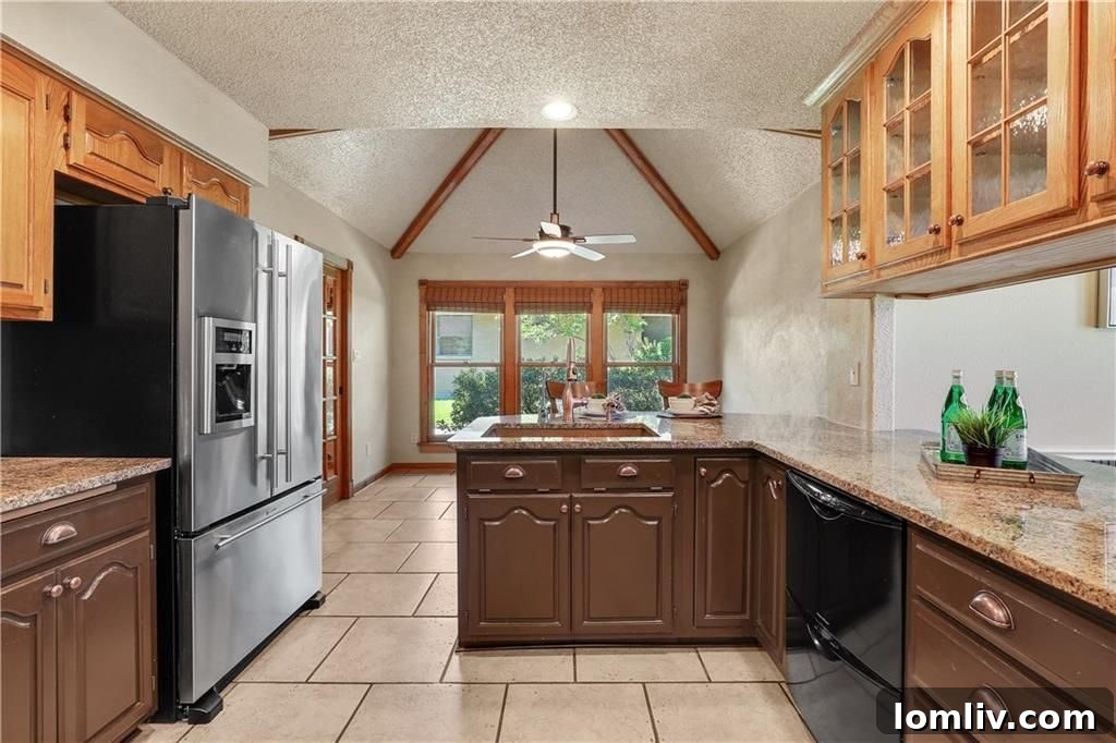 Modern and well-equipped kitchen with high-end appliances and ample counter space for culinary endeavors