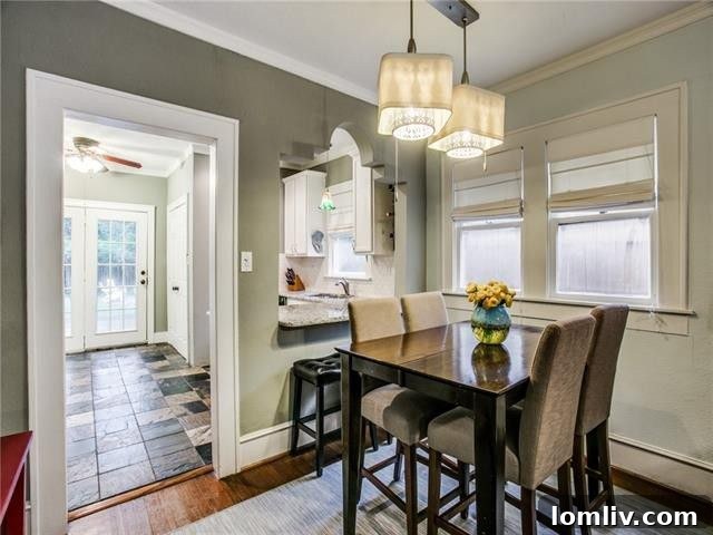 Kitchen sink area with large window overlooking the backyard.